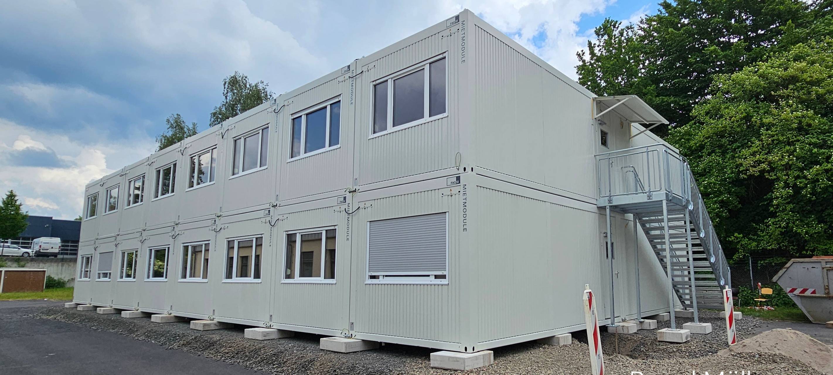 Bürgerinitiative wehrt sich juristisch gegen Obdachlosen-Container in Siegen